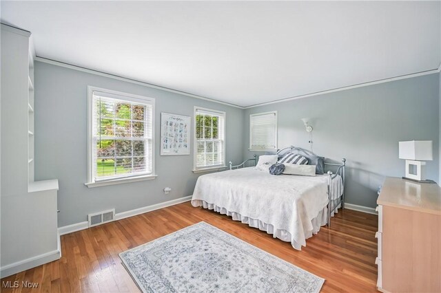 3711 Sampson Rd, Youngstown, OH 44505 - bedroom with wood finished floors, baseboards, and ornamental molding