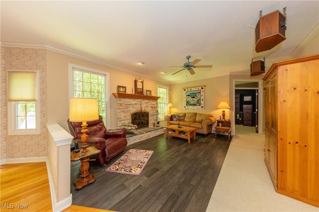 1030 Whisperwood Ln, Aurora, OH 44202 - living area featuring plenty of natural light, baseboards, ornamental molding, a fireplace, and ceiling fan