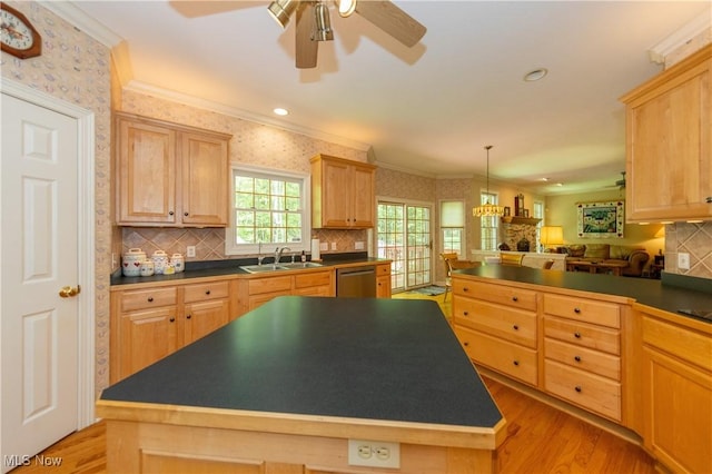 1030 Whisperwood Ln, Aurora, OH 44202 - kitchen with light wood-type flooring, ceiling fan, dark countertops, a sink, and light brown cabinetry