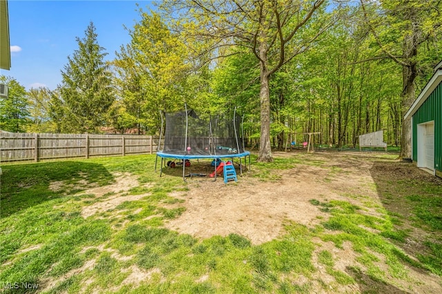 4946 Ireland Rd, Rome, OH 44085 - view of yard featuring a trampoline
