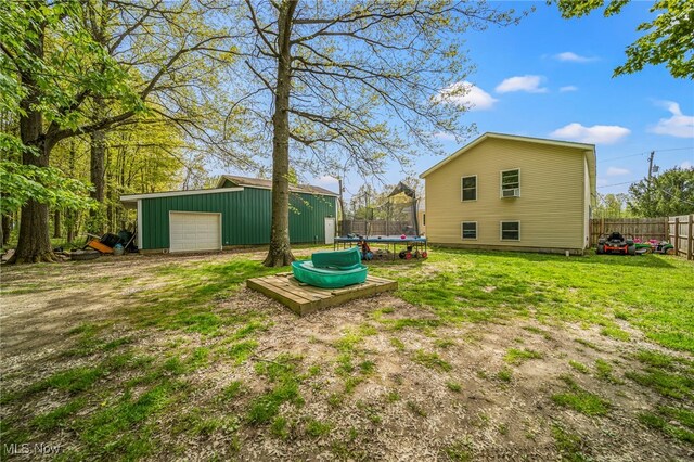 4946 Ireland Rd, Rome, OH 44085 - view of yard with a trampoline and an outdoor structure