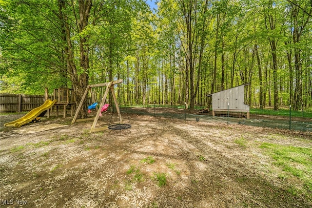 4946 Ireland Rd, Rome, OH 44085 - view of yard with a playground and fence