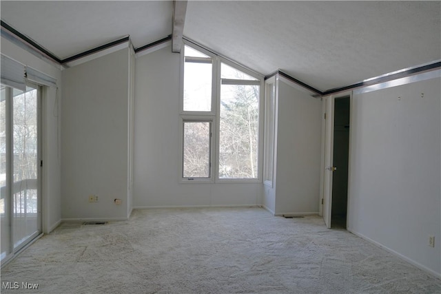 250 Laurel Cir Unit 13, Aurora, OH 44202 - unfurnished bedroom featuring carpet floors and access to exterior