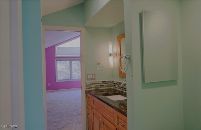 250 Laurel Cir Unit 13, Aurora, OH 44202 - bathroom with vaulted ceiling and vanity