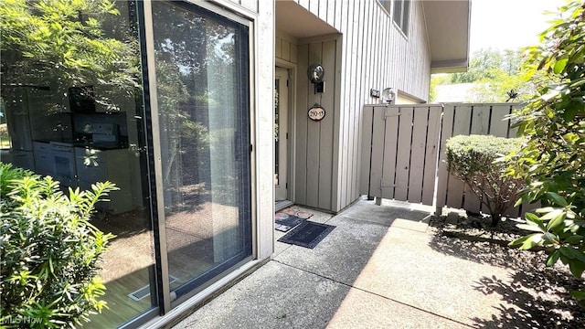 250 Laurel Cir Unit 13, Aurora, OH 44202 - doorway to property featuring board and batten siding
