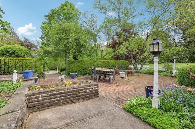 view of patio with outdoor dining area