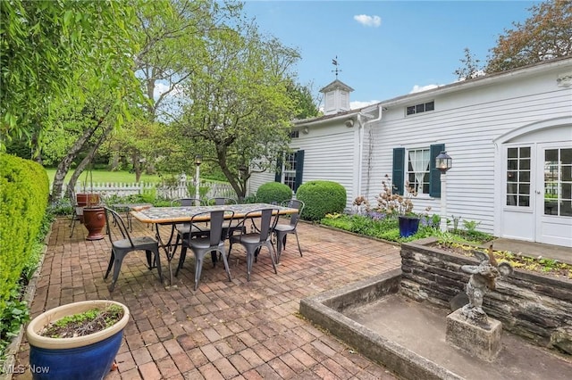 view of patio / terrace with fence and outdoor dining space