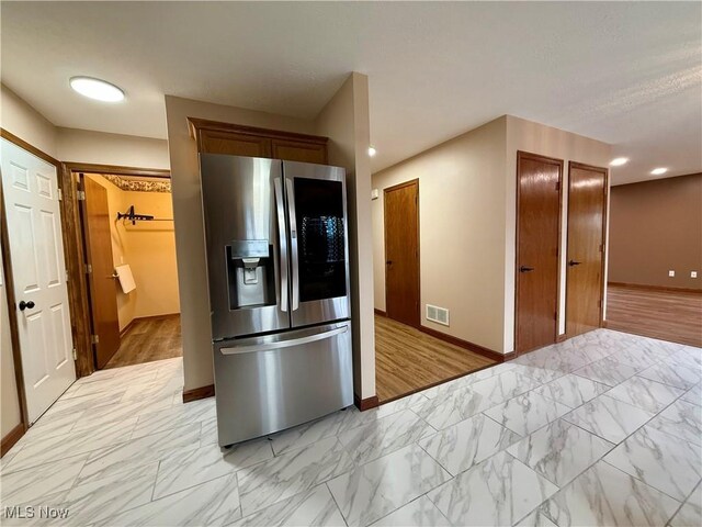 36 Choctaw Trl, Malvern, OH 44644 - kitchen with stainless steel refrigerator with ice dispenser, baseboards, light marble finish floors, and recessed lighting