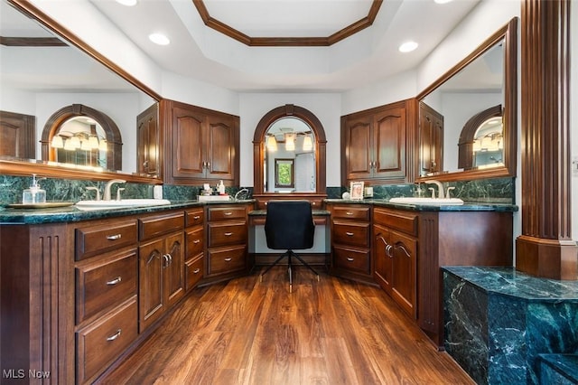 7384 Braucher St NW, North Canton, OH 44720 - office space featuring a tray ceiling, recessed lighting, dark wood-style floors, built in desk, and a sink