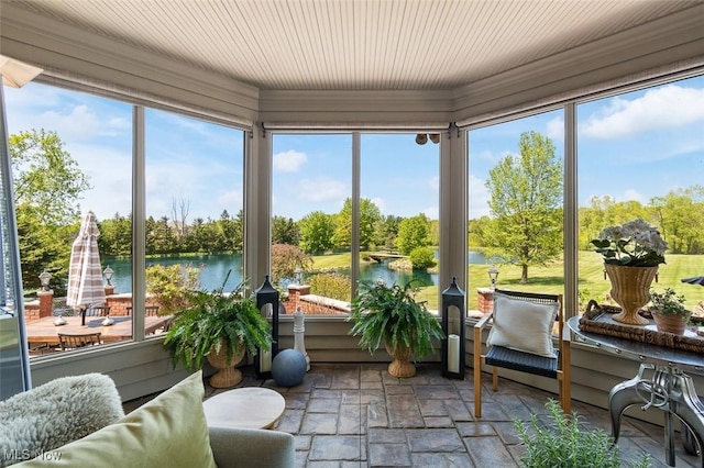 7384 Braucher St NW, North Canton, OH 44720 - sunroom / solarium with stone tile flooring, a water view, and healthy amount of natural light