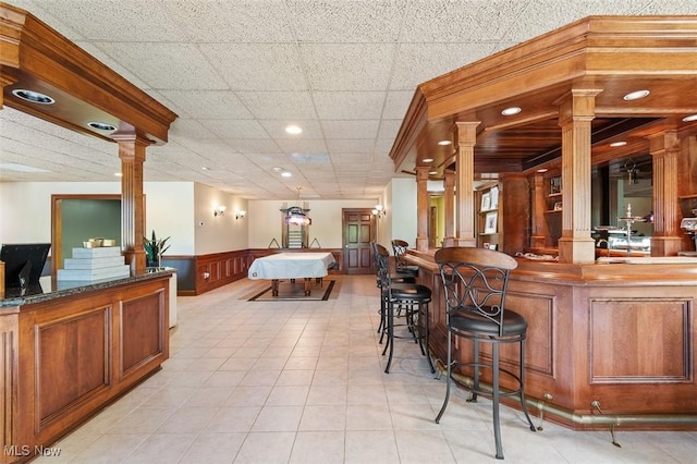 7384 Braucher St NW, North Canton, OH 44720 - community bar area with ornate columns, wainscoting, light tile patterned floors, and recessed lighting