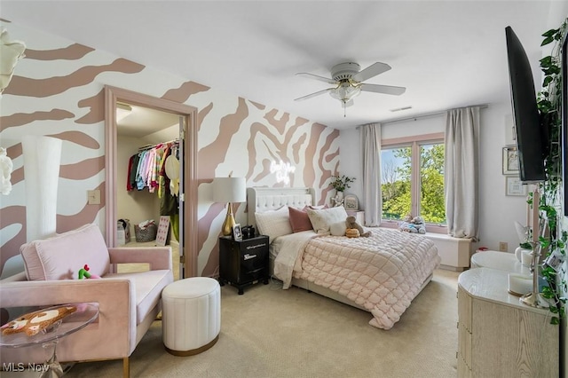 7384 Braucher St NW, North Canton, OH 44720 - bedroom with wallpapered walls, light carpet, ceiling fan, and a closet