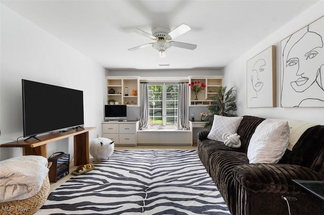 7384 Braucher St NW, North Canton, OH 44720 - living area featuring ceiling fan