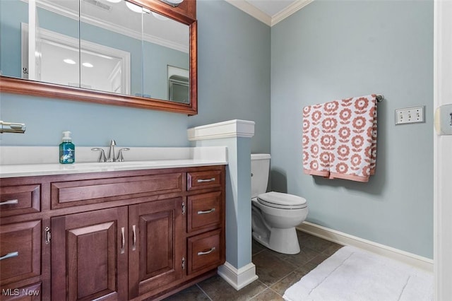 7384 Braucher St NW, North Canton, OH 44720 - bathroom with ornamental molding, baseboards, vanity, toilet, and tile patterned flooring