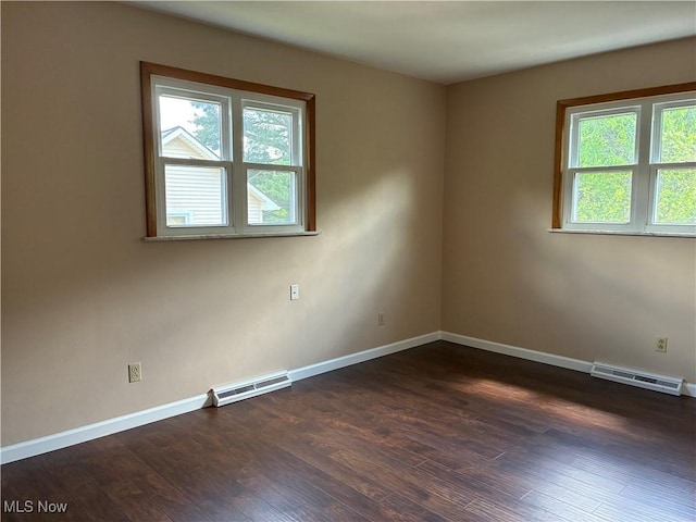 260 Miller Ave, Weirton, WV 26062 - unfurnished room featuring plenty of natural light, baseboards, and dark wood finished floors