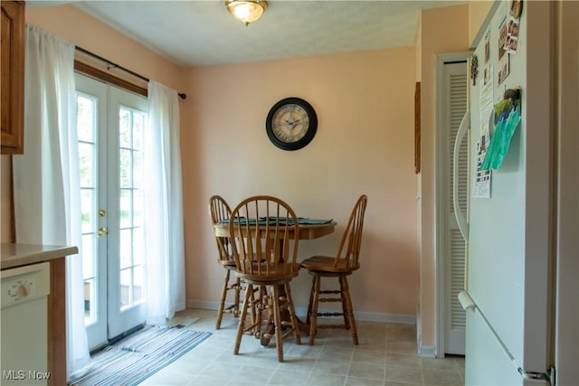 7969 Bricker Rd NW, Massillon, OH 44646 - dining area with french doors and baseboards