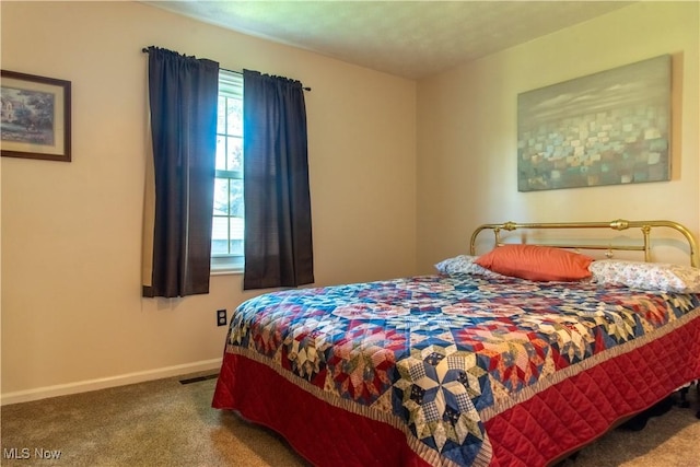 7969 Bricker Rd NW, Massillon, OH 44646 - bedroom with carpet flooring and baseboards