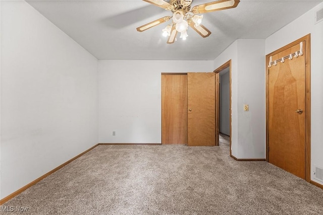 67 Chestnut Ave, Northfield, OH 44067 - unfurnished bedroom featuring carpet, baseboards, and ceiling fan