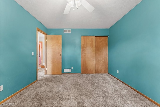 67 Chestnut Ave, Northfield, OH 44067 - unfurnished bedroom with a closet, carpet, baseboards, and ceiling fan