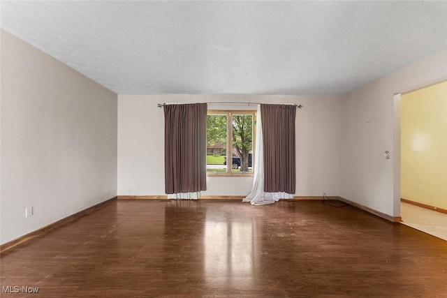 67 Chestnut Ave, Northfield, OH 44067 - spare room featuring wood finished floors and baseboards