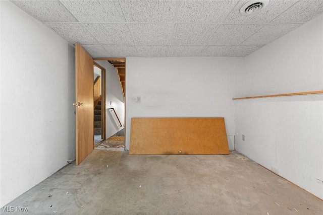 67 Chestnut Ave, Northfield, OH 44067 - unfurnished room featuring unfinished concrete floors and stairway