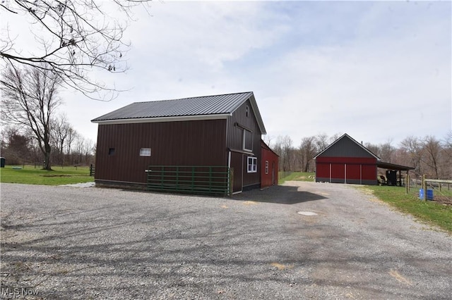 7833 Pymatuning Lake Rd, Williamsfield, OH 44093 - view of pole building featuring a barn