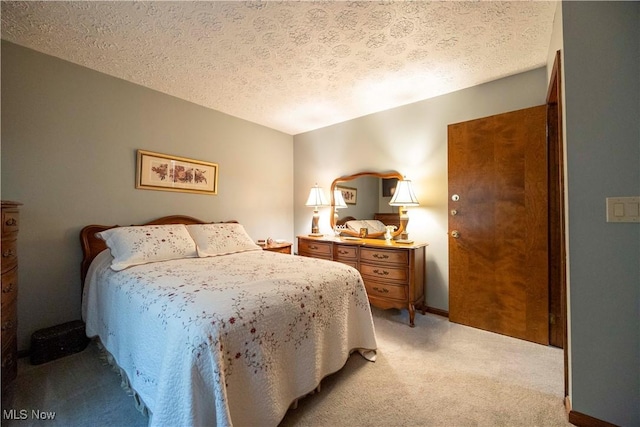 8665 Prescott Dr, Chesterland, OH 44026 - bedroom featuring light colored carpet and a textured ceiling