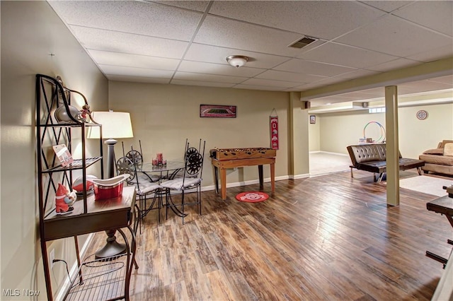 650 Thornhill Ln, Aurora, OH 44202 - playroom featuring a drop ceiling, wood finished floors, and baseboards