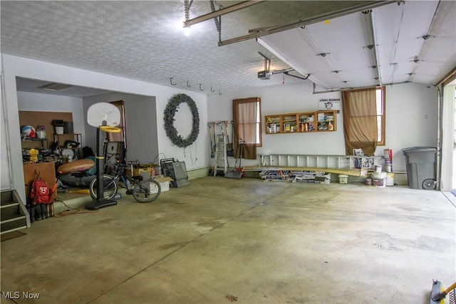 650 Thornhill Ln, Aurora, OH 44202 - garage featuring a garage door opener