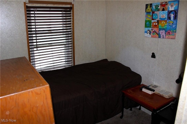 3560 Orchard Unit A-22, Stow, OH 44224 - bedroom with carpet and a textured wall