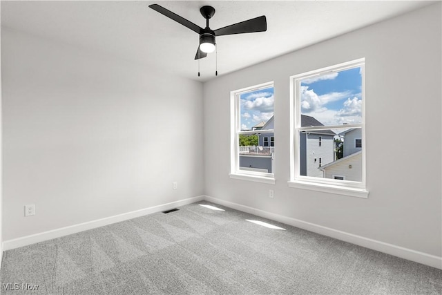 374 Bascule Dr, Lorain, OH 44052 - spare room with carpet and a ceiling fan