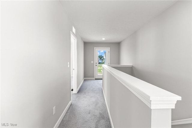 374 Bascule Dr, Lorain, OH 44052 - hall featuring an upstairs landing and light carpet