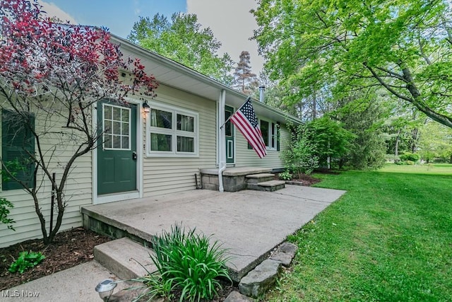 13970 E Willard Rd, Novelty, OH 44072 - rear view of property featuring a yard