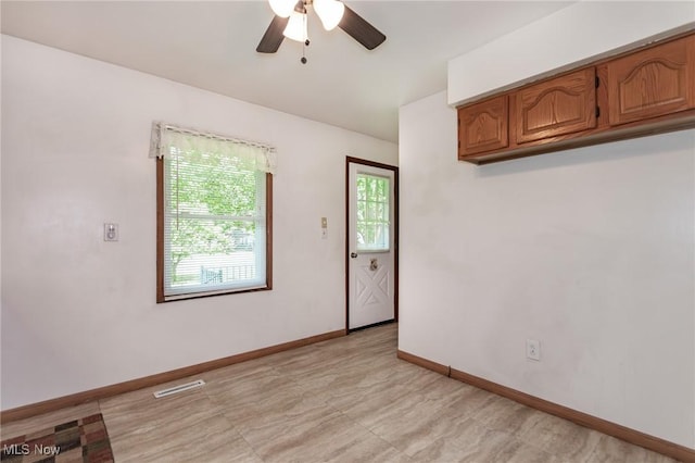13970 E Willard Rd, Novelty, OH 44072 - spare room featuring ceiling fan and baseboards