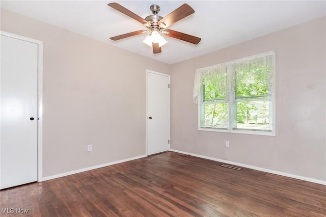 13970 E Willard Rd, Novelty, OH 44072 - spare room with wood finished floors, baseboards, and a ceiling fan