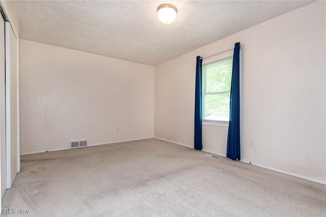13970 E Willard Rd, Novelty, OH 44072 - carpeted empty room featuring baseboards