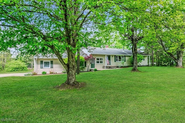 13970 E Willard Rd, Novelty, OH 44072 - single story home with a front lawn and a chimney