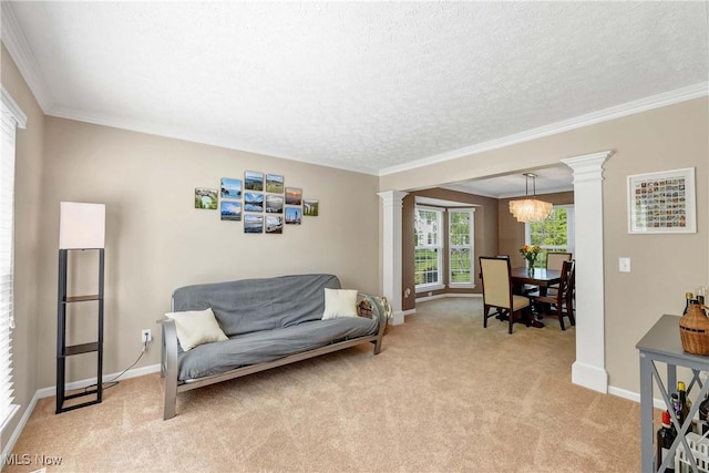 living area featuring decorative columns, light carpet, a chandelier, baseboards, and a textured ceiling