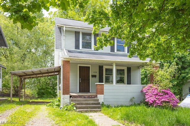 408 Bacon, Akron, OH 44320 - view of front facade featuring covered porch and dirt driveway