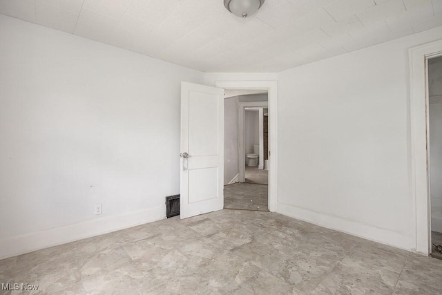 408 Bacon, Akron, OH 44320 - spare room featuring baseboards