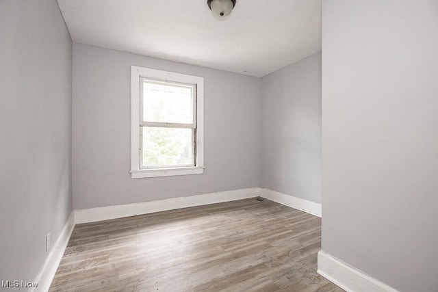 408 Bacon, Akron, OH 44320 - unfurnished room featuring baseboards and wood finished floors