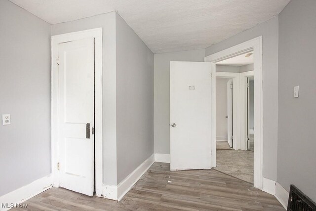 408 Bacon, Akron, OH 44320 - corridor featuring wood finished floors and baseboards