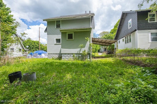 408 Bacon, Akron, OH 44320 - back of property featuring fence and a carport