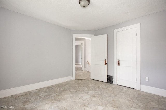 408 Bacon, Akron, OH 44320 - unfurnished bedroom featuring baseboards