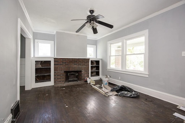 408 Bacon, Akron, OH 44320 - unfurnished living room featuring wood-type flooring, crown molding, a ceiling fan, a wood stove, and baseboards