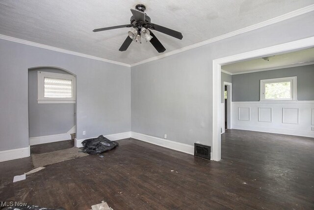 408 Bacon, Akron, OH 44320 - unfurnished room with healthy amount of natural light, wood-type flooring, crown molding, and ceiling fan