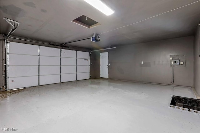 35 W 5th St, Dresden, OH 43821 - garage featuring a garage door opener