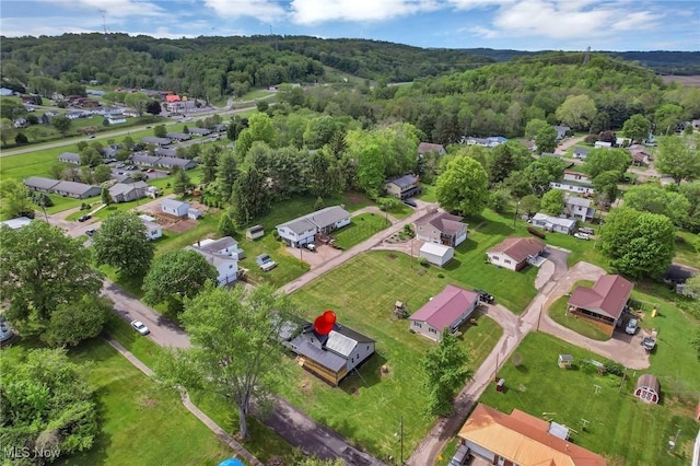 35 W 5th St, Dresden, OH 43821 - view of property location with a heavily wooded area and nearby suburban area