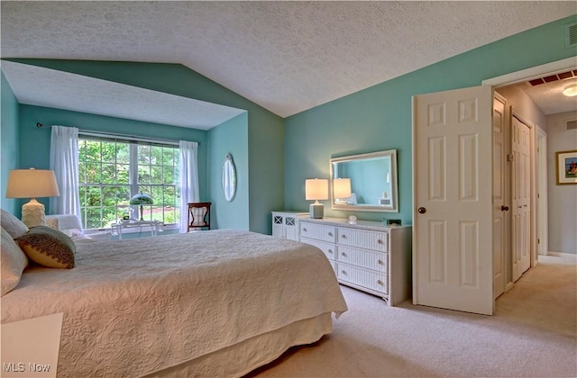 401 Bounty Way, Avon Lake, OH 44012 - bedroom featuring a textured ceiling, lofted ceiling, and light carpet