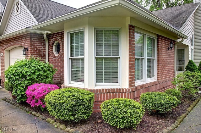 401 Bounty Way, Avon Lake, OH 44012 - view of side of home featuring brick siding and a shingled roof